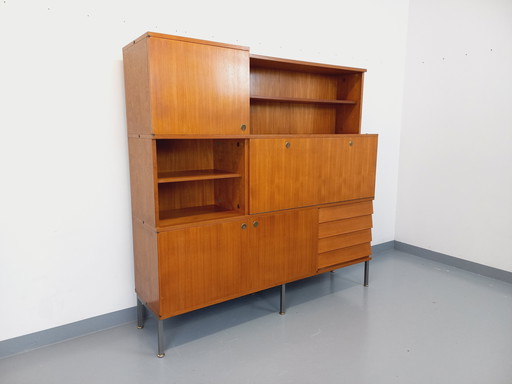 Louis Paolozzi's vintage modernist secretary bookcase for Monopoly in teak and metal from the 60s