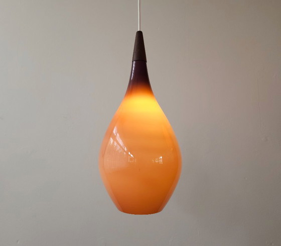 Image 1 of Drop glass mcm pendant lamp, white opal glass with purple top coat, scandinavian design