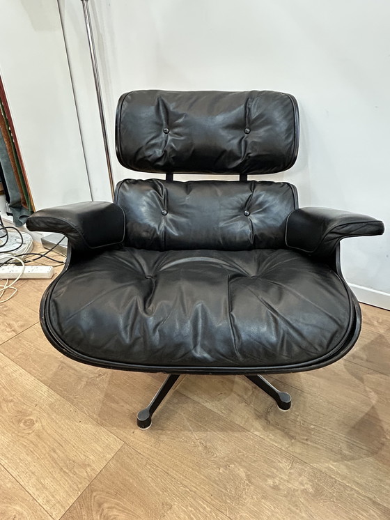 Image 1 of Een paar Eames loungestoelen