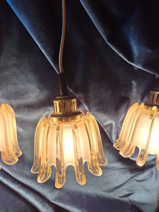 Image 1 of Set van 3 Doria hanglampen van messing en amberkleurig mat glas, jaren 1960