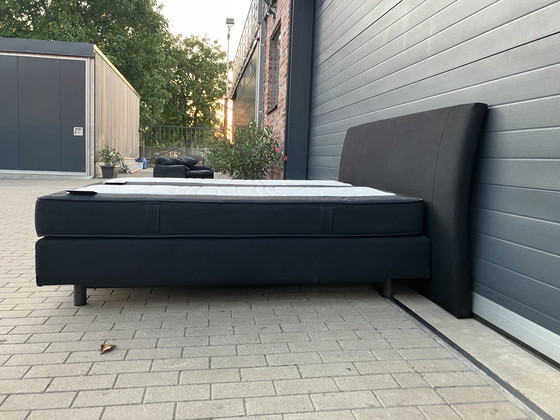Image 1 of Auping Boxspring 160x200 nero con materassi Auping Cresto in ottime condizioni!