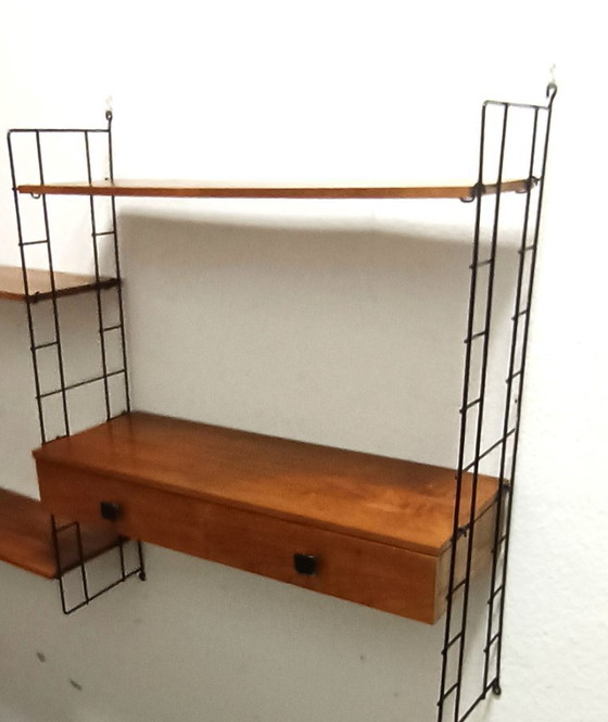 Image 1 of groot vijftiger jaren wandrek met lades en schappen 