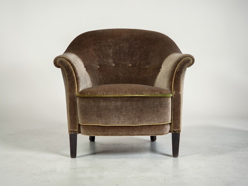 Fauteuil danois des années 1960, revêtement d'origine en velours vert.