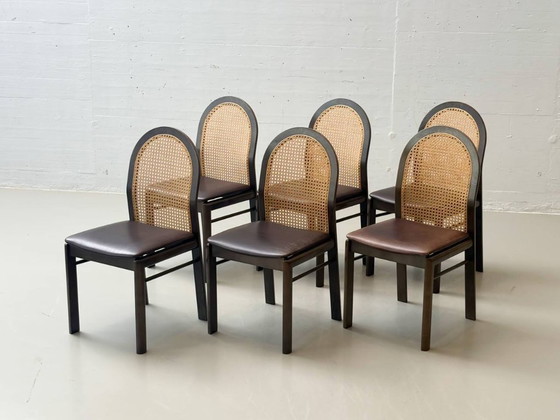 Image 1 of Set van 6 stoelen met rieten en lederen zittingen van Dietiker, jaren 80.
