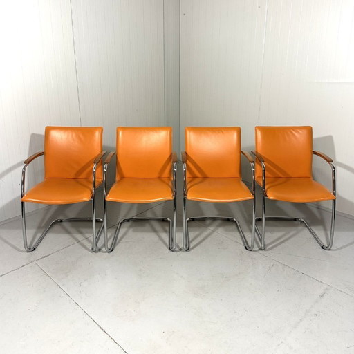 4 X Leolux Freyr chairs in orange leather