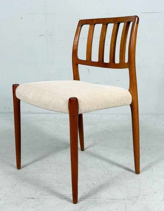 Image 1 of JL Møllers, ensemble de 4 chaises de salle à manger, modèle '83', teck, laine, années 1960, Danemark (4)