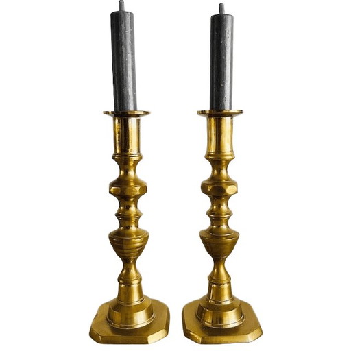 Set of antique English brass pusher candlesticks from the 1890s