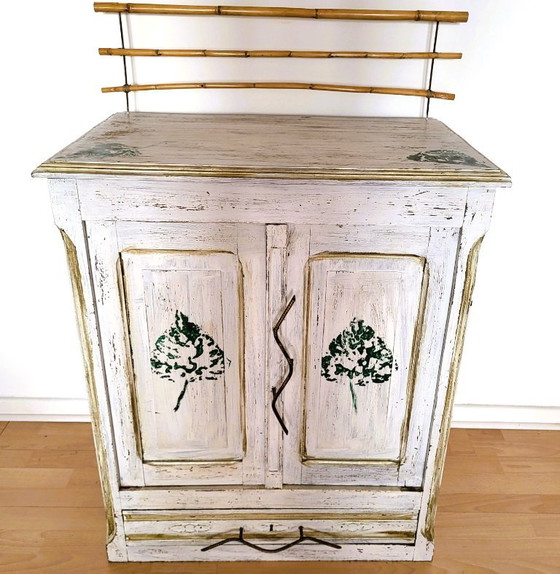 Image 1 of Elegant small patinated sideboard