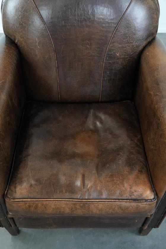 Image 1 of Fauteuil vintage en peau de mouton avec du caractère