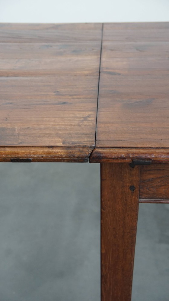 Image 1 of Table de salle à manger ancienne en chêne du début des années 1900 avec plateau rabattable d'un côté