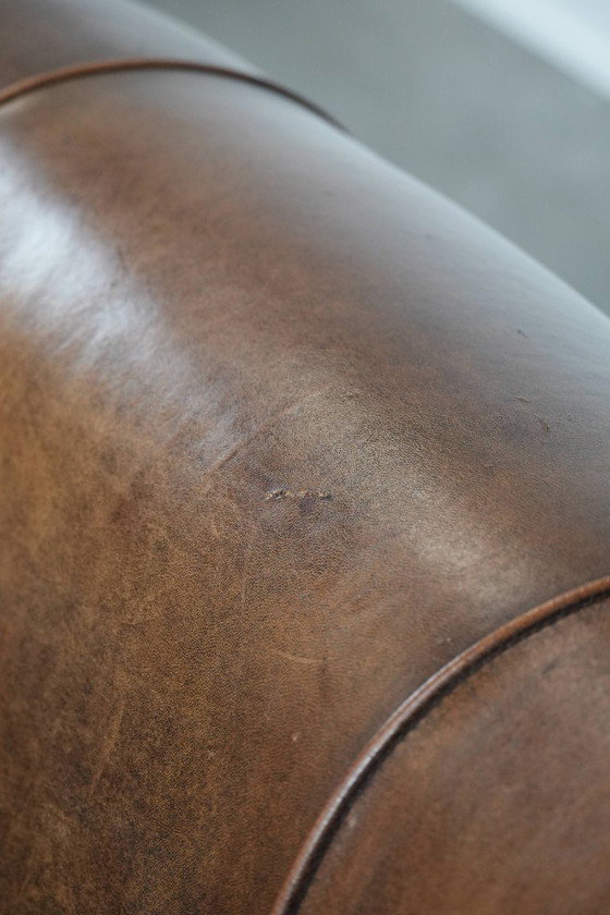 Image 1 of Vintage stoere 2-zits clubbank gemaakt van schapenleer