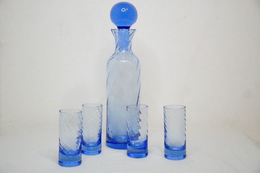 Juego de decantador vintage de vidrio azul con 4 vasos de chupito