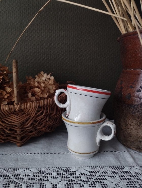 Image 1 of Een paar Sarreguemines ondoorzichtige porseleinen vuurkorfjes (1857-1900)