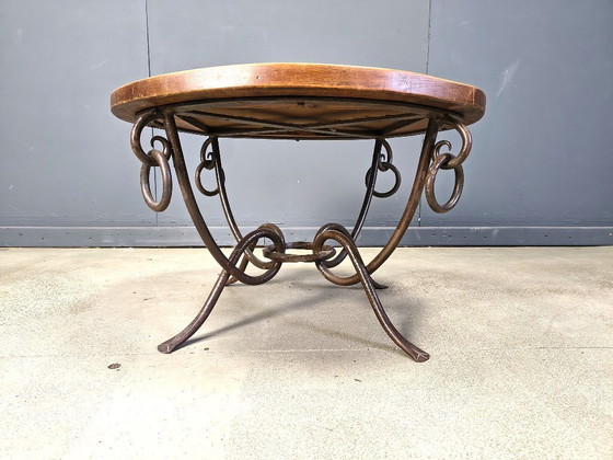 Image 1 of Smeedijzeren salontafel van René Drouet, jaren 1940.