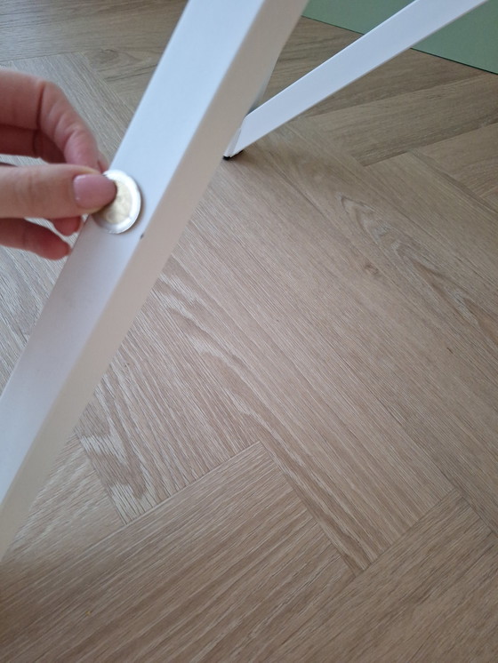 Image 1 of Round white table