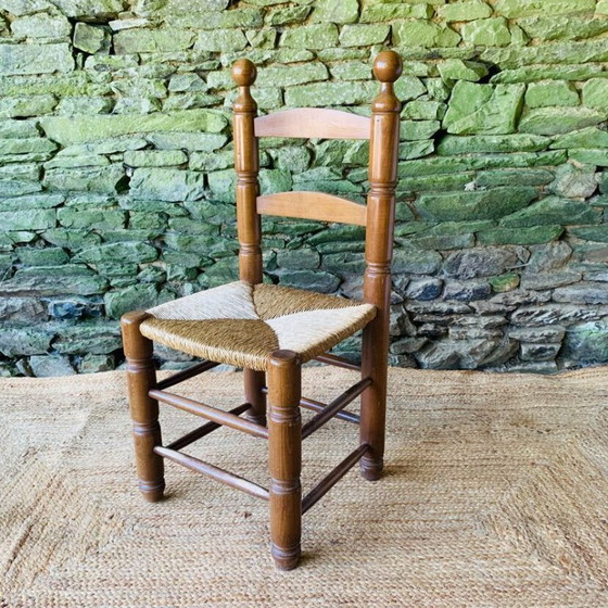 Image 1 of Set van 4 massief houten stoelen met rieten zittingen