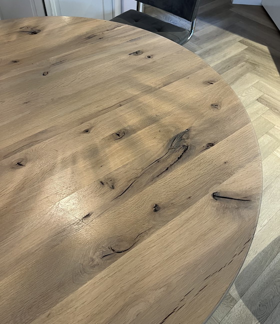 Image 1 of Round oak wooden dining table with industrial steel legs