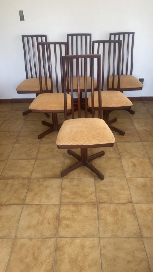 6 beautiful A.H. Macintosh swivel chairs in teak