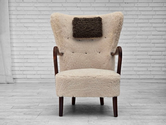 Image 1 of Jaren 60, Deens ontwerp van A. Christensen voor Slagelse Møbelværk, schapenvacht.