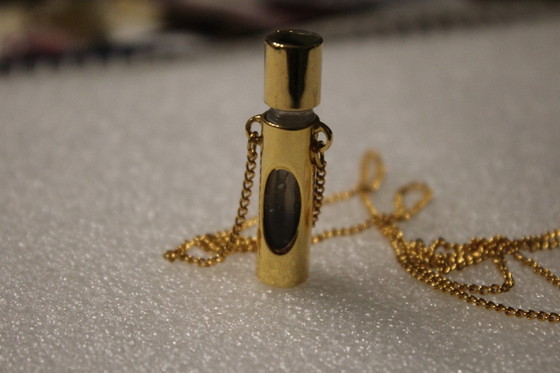Image 1 of Jovan parfumhanger met ketting, goudkleurig, met glazen flesje, vintage, zeldzaam