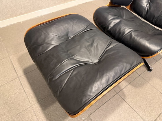 Image 1 of Herman Miller / Contura | Charles & Ray Eames | Lounge Chair & Ottoman | Rosewood & Black Leather | 1x Set