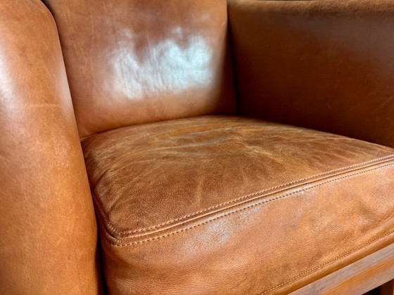 Image 1 of Schuitema Shaker comfortable club armchair in cognac aniline leather with graphic textile panels all around