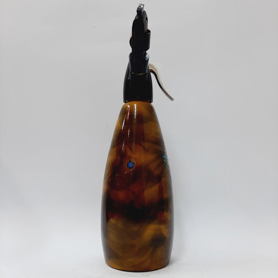 Image 1 of Vintage jaren 70 gele/bruine metalen frisdrankfles