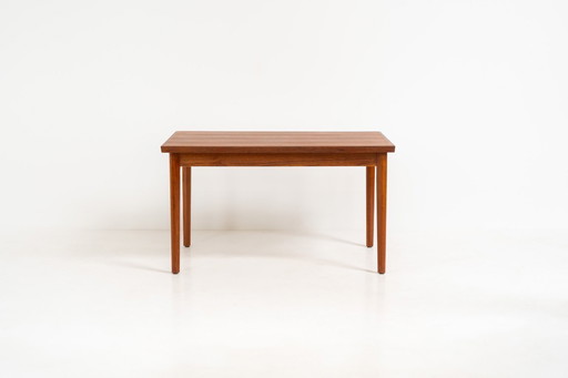 Extendable dining table by Henning Kjaernulf for Vejle Møbelfabrik (Denmark, 1960s).