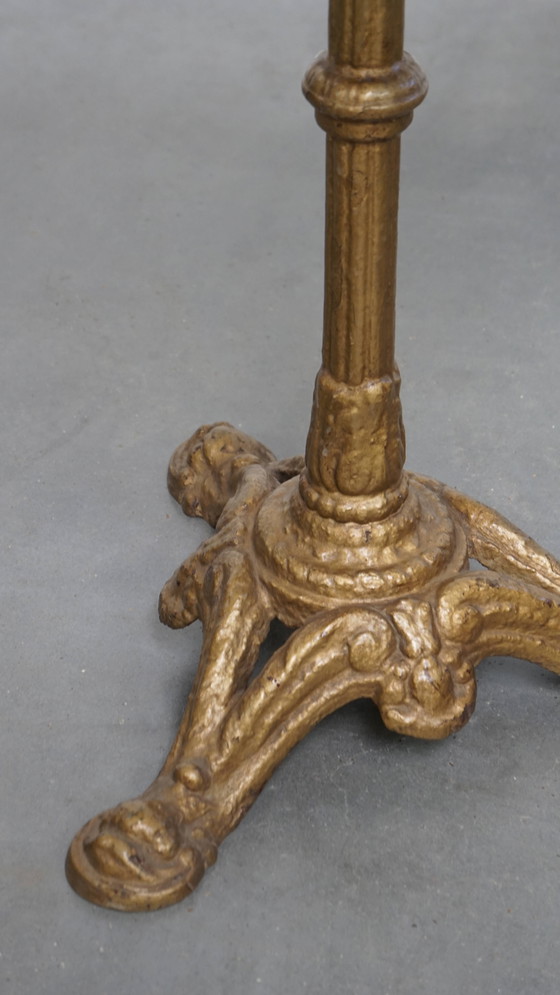 Image 1 of Table de bistrot française ancienne avec pied en fonte dorée et plateau en chêne foncé