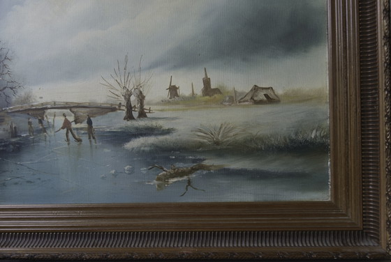 Image 1 of Pintura al óleo original "Paisaje invernal holandés con patinadores" de Frits Meijer