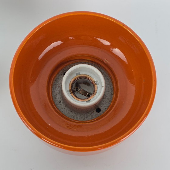 Image 1 of Vintage German ceramic lamp with a glass globe shade. Can be used as a wall lamp, table lamp, or sconce. Orange. 70s / retro