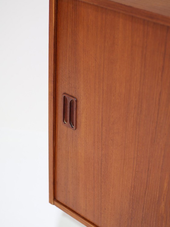 Image 1 of Danish vintage teak wood sliding door cabinet