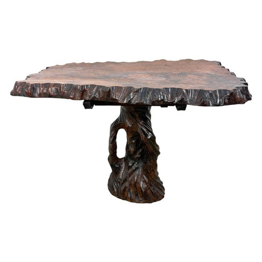 Hand-carved organic side table made of camphor wood – sculptural brutalist design