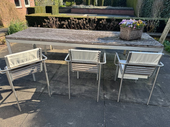 Image 1 of garden set, table, 3 chairs and 2 garden benches