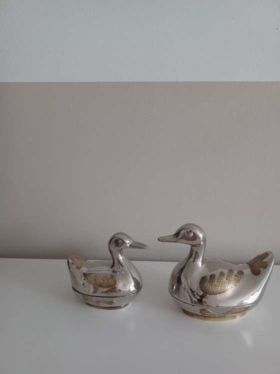 Image 1 of Vintage koppel tinnen eendjes met koper. Opbergdoosjes.