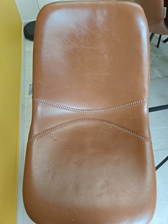 Image 1 of 7 Dutchbone cognac chairs