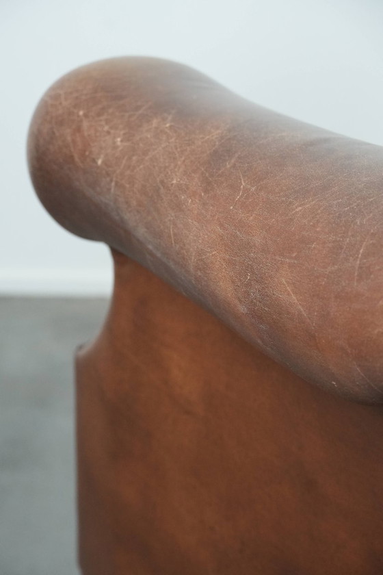 Image 1 of cognac kleurige vintage rundleren clubfauteuil in Engelse stijl 