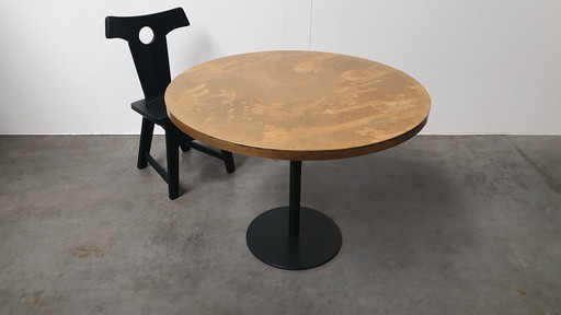 Brass patinated table round wabi sabi cast iron base Pedrali