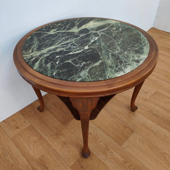 Image 1 of Vintage round wooden coffee table with onyx marble top