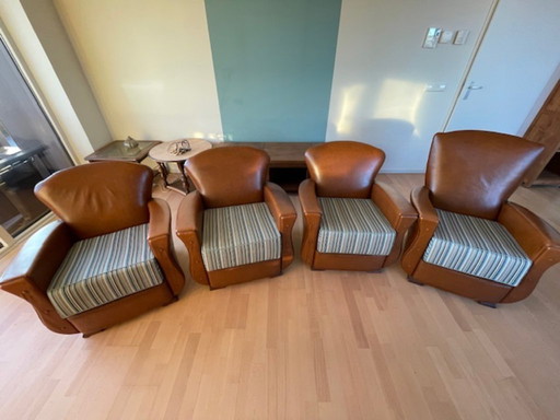 Mid 1900 lederen fauteuils