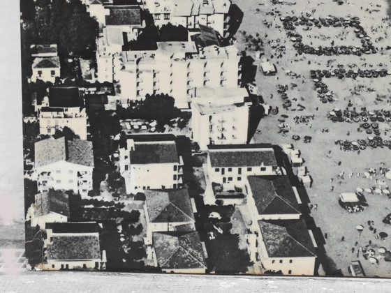 Image 1 of Cocacola umbrellas aerial photography Jesolo beach Italy years '60 by studio Ferruzzi Venice and Marco Lion photographer.