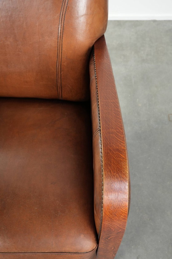 Image 1 of Beautiful sheepskin armchair in Art Deco style with wooden armrests