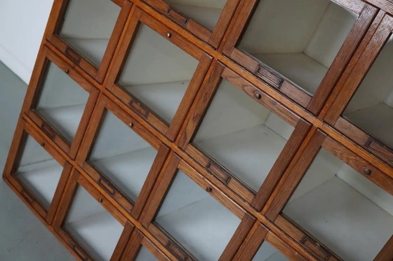 Image 1 of Antique large Dutch oak haberdashery cabinet with hinged doors, 1920s/30s
