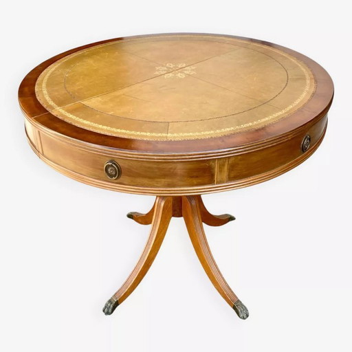 Round mahogany table with English-style leather top