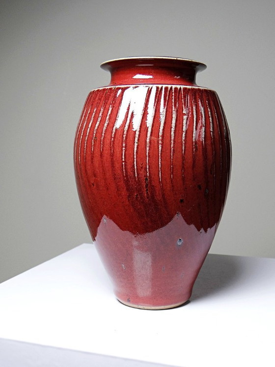 Image 1 of Oxblood-blood glazed stoneware vase with ribs, 20th-century workshop piece