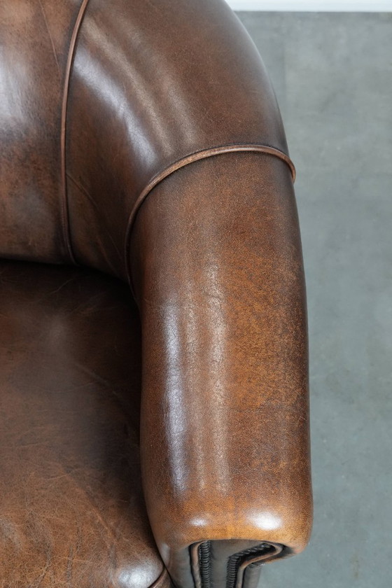 Image 1 of 2 poltrone da club in pelle di pecora con cuscino di seduta fisso e bellissimi colori