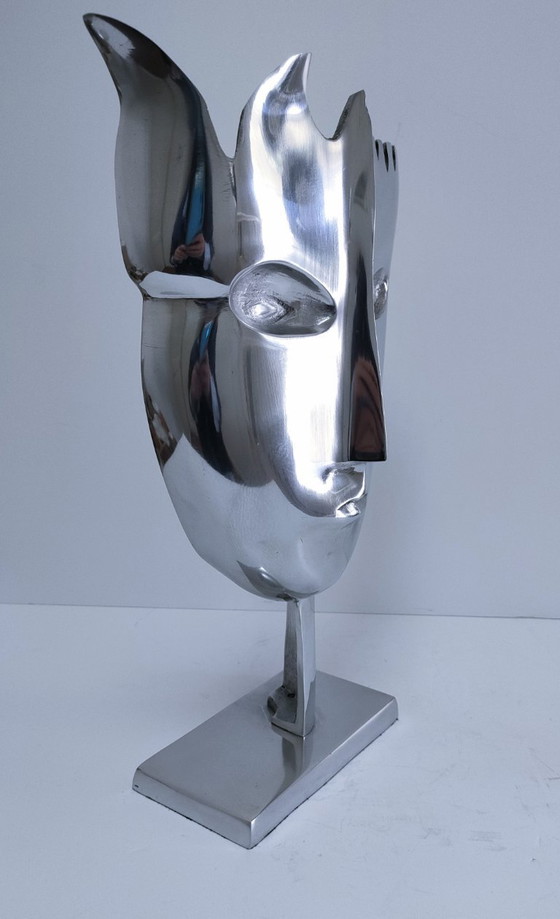 Image 1 of sculpture visage stylisé métal poli