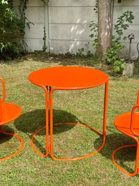 Image 1 of Gae Aulenti - oranje gelakte tuintafel