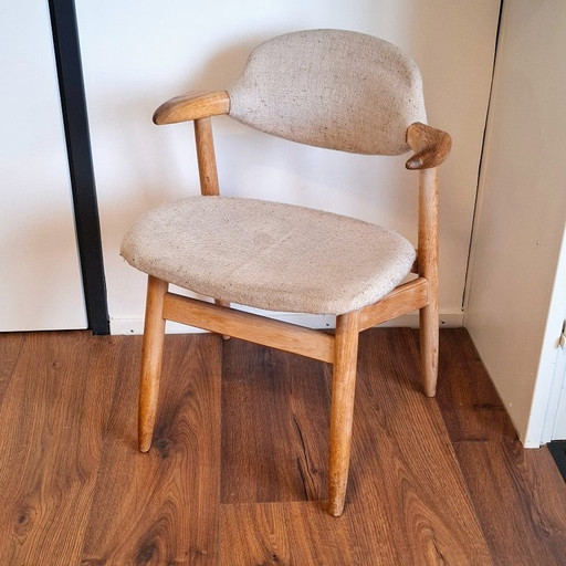 Sedia in corno di mucca con seduta e schienale in tessuto