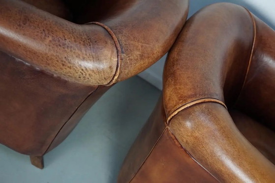 Image 1 of Vintage Nederlandse clubfauteuils van cognackleurig leer, set van 2